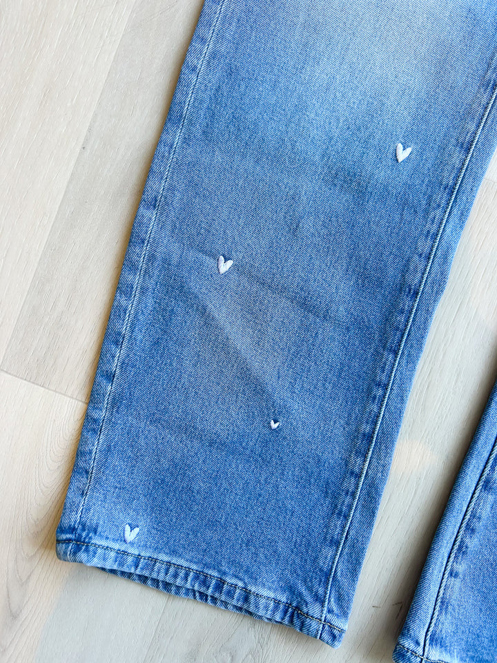 Flora Mid Rise Barrel Jean